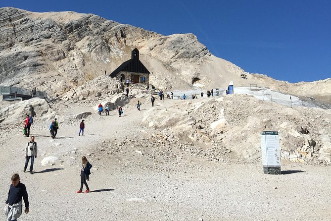 A Private Zugspitze Mountain Tour and Pretzel Making Experience - Zugspitze: Germany’s tallest peak, reached by cable car