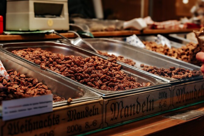 Christmas Markets Food Tour in Munich - Odeonsplatz medieval market: buskers, costumes, and a big finale sip