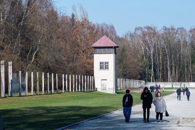 Dachau Concentration Camp Memorial Site Tour from Munich by Train - The former camp tour: gate, barracks, cells, and guard posts