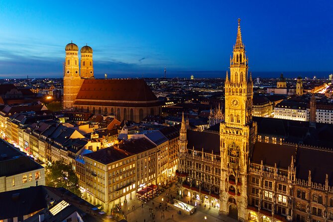 Night watchman torchlight tour in Munich - Marienplatz and the Marian Column: Old Meets New Town Hall