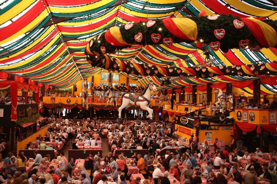 Oktoberfest Munich: Lunch/Dinner table reserv. big beer tent - Timing Rules: Midday Slots vs Evening Slots (and Why Evening Costs More)