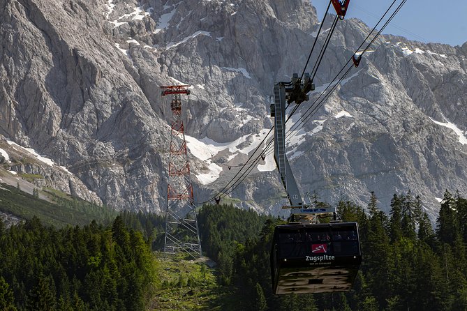Zugspitze, Germany's Highest Mountain, Day Tour from Munich - Downhill on the Zugspitzbahn cogwheel train: scenic, efficient, slightly mixed